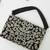 Black velvet beads embroidered clutch