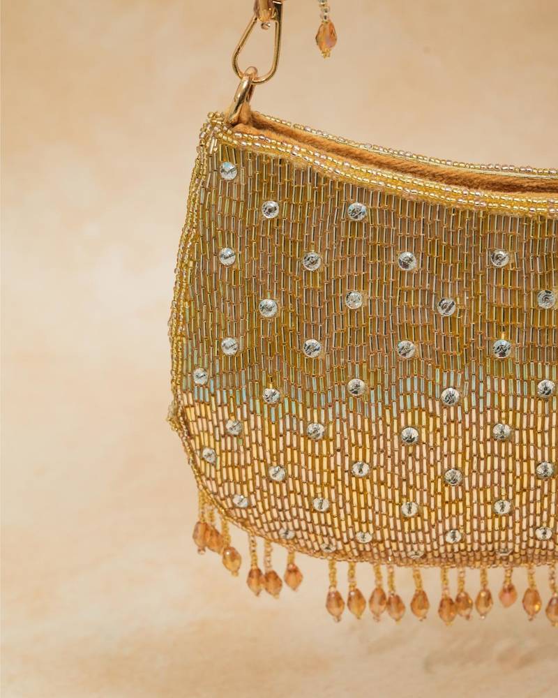 Gold silk embroidered clutch