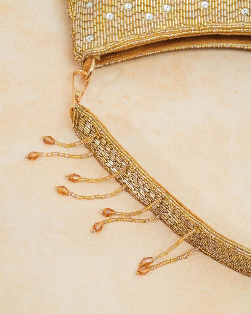 Gold silk embroidered clutch