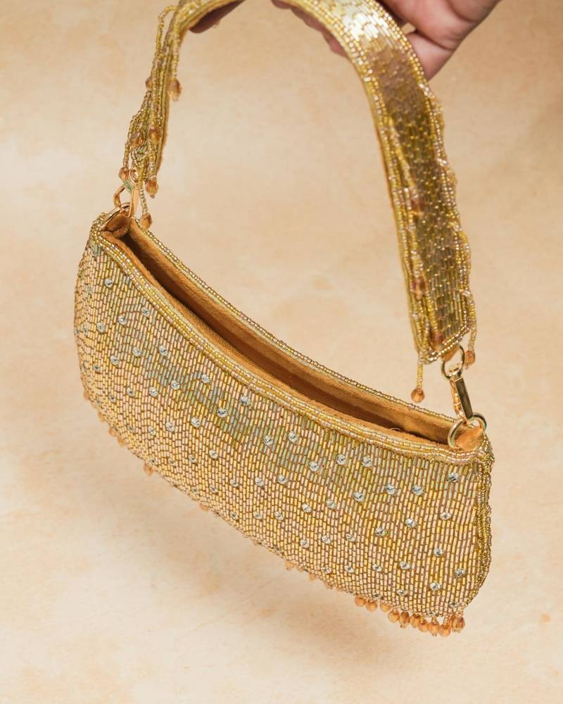 Gold silk embroidered clutch