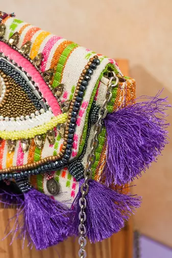 multicolor beads & tassel embellished jacquard sling clutch