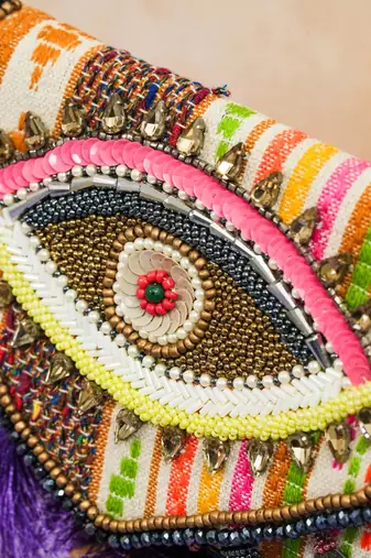 multicolor beads & tassel embellished jacquard sling clutch