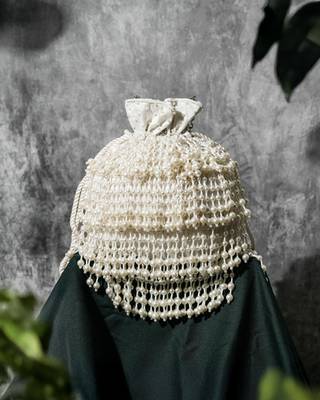 white pearl embroidered silk potli bag 1
