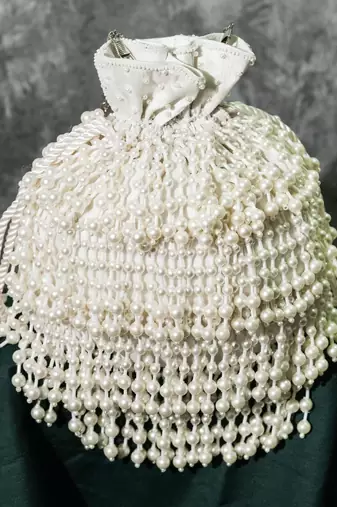 white pearl embroidered silk potli bag