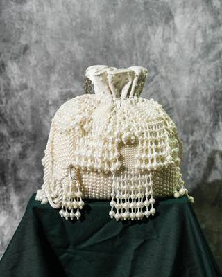 white pearl embroidered silk potli bag 3