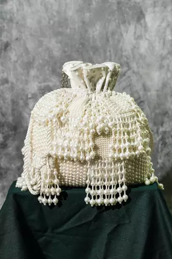 white pearl embroidered silk potli bag