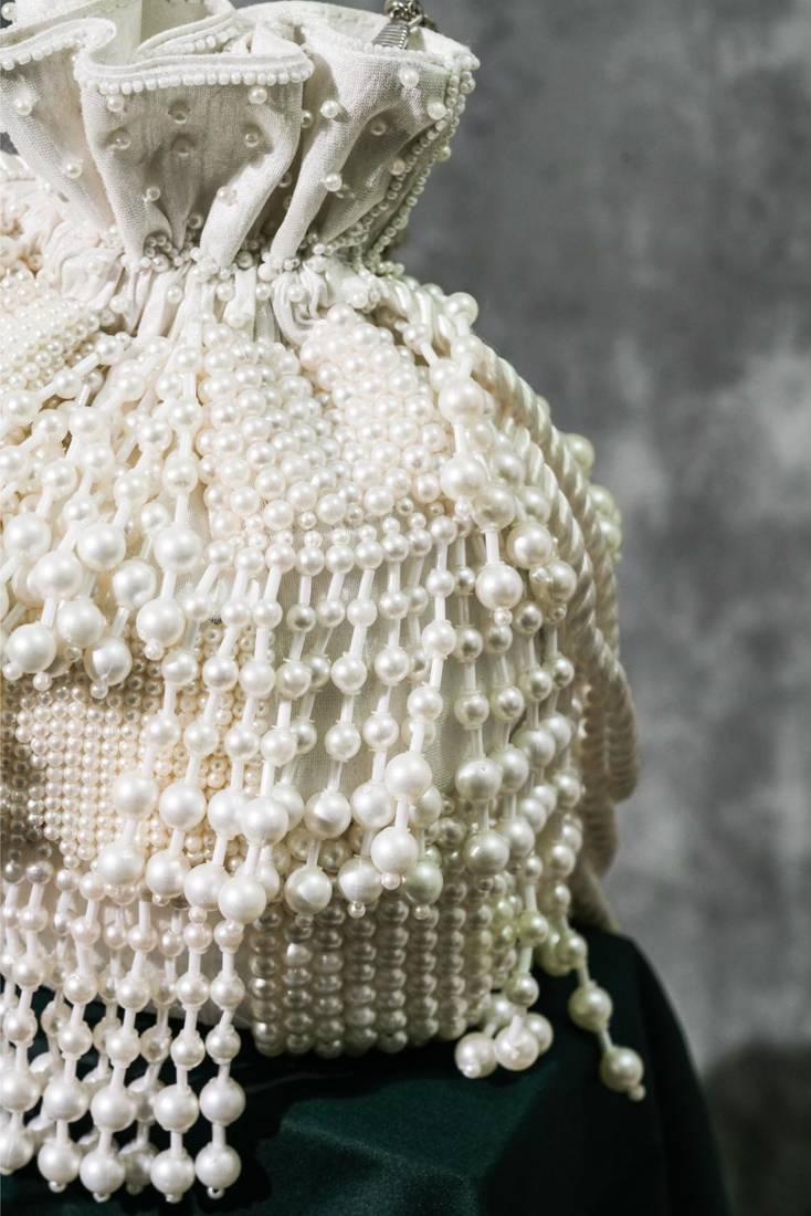 Pearl embroidered silk potli bag