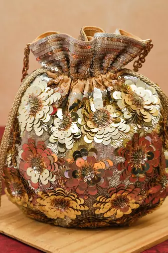 festive gold silk floral embroidered potli bag