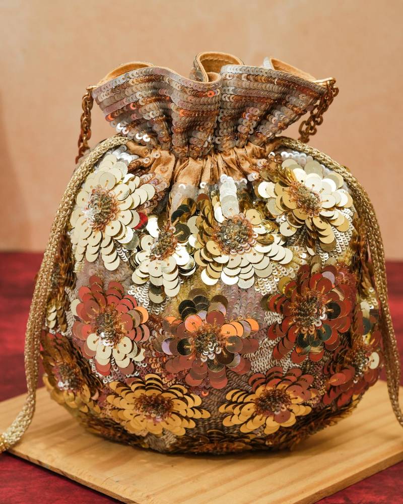 Gold silk floral embroidered potli bag