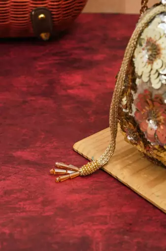 festive gold silk floral embroidered potli bag