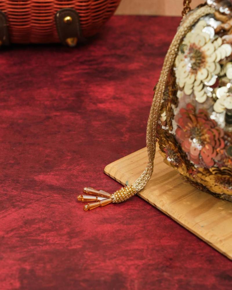 Gold silk floral embroidered potli bag