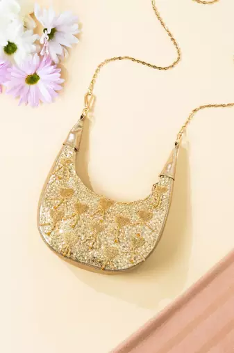 Gold leather sequin embroidered clutch