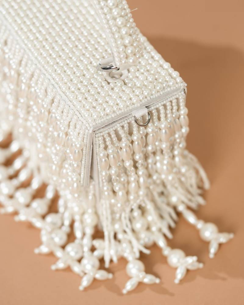 Pearl embroidered silk potli bag