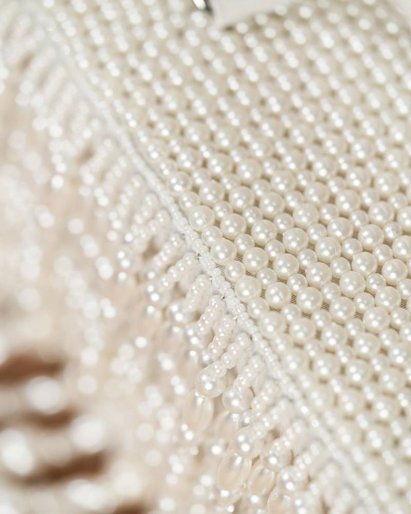 Pearl embroidered silk potli bag