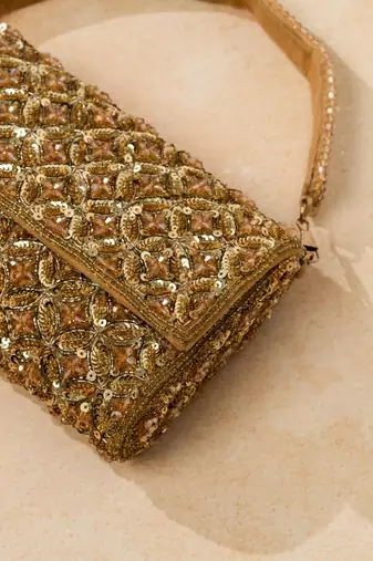 gold textured sequin embroidered silk clutch