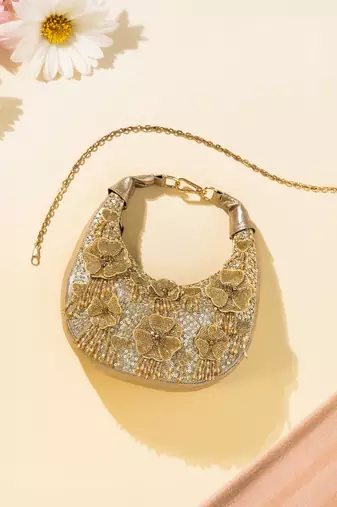 gold floral embellished leather clutch with sequins