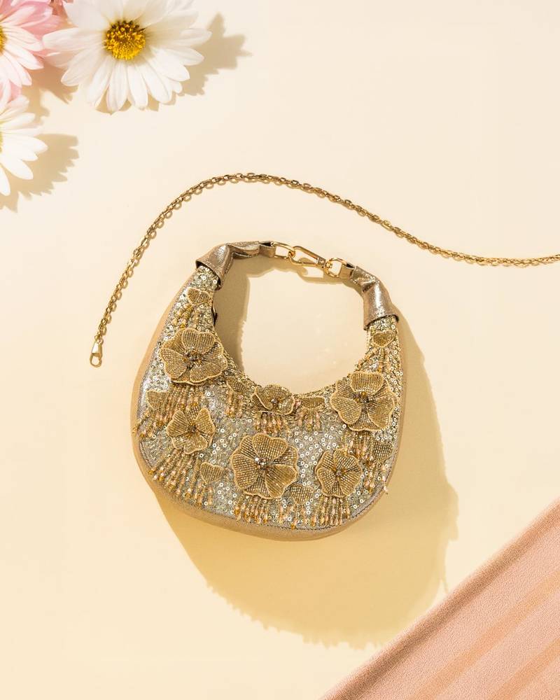 Gold leather floral embroidered clutch