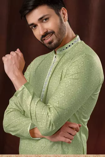 Straight art silk light green solid collar neck with embroidery kurta payjama