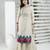 Beige embroidered silk straight cut kurta sharara set