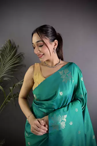 Teal lichi blend silk flower zari weaving banarasi saree