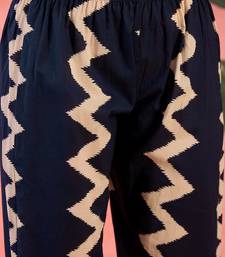 Women's navy blue & beige geometric printed a-line kurta with trousers & dupatta