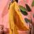Women's mustard bandhani printed kurta with trousers & dupatta