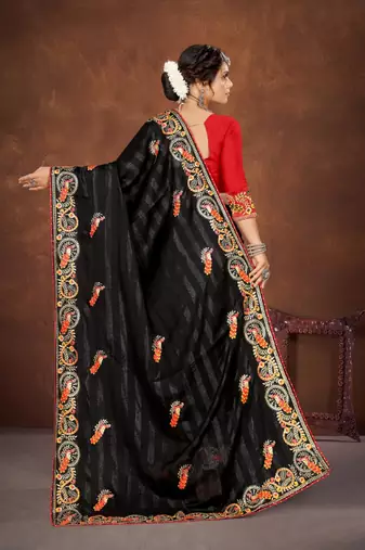 Black color embroidered rimzhim patta saree with banglori silk blend blouse