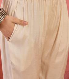 Women's cream & black floral printed kurta with trousers & dupatta