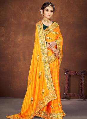 Yellow color embroidered rimzhim patta saree with banglori silk blend blouse 3