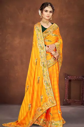 Yellow color embroidered rimzhim patta saree with banglori silk blend blouse