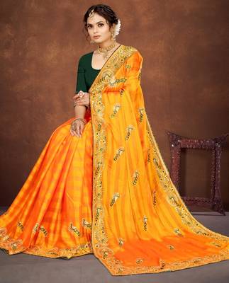 Yellow color embroidered rimzhim patta saree with banglori silk blend blouse 4