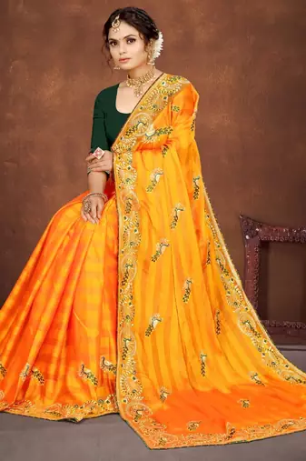 Yellow color embroidered rimzhim patta saree with banglori silk blend blouse