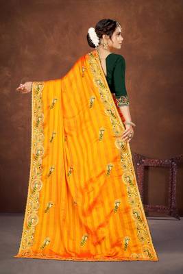 Yellow color embroidered rimzhim patta saree with banglori silk blend blouse 5