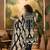 Women's dark teal blue & beige geometric printed kurta with trousers & dupatta