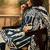 Women's dark teal blue & beige geometric printed kurta with trousers & dupatta