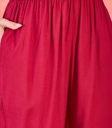 Women's rani pink v-neck embroidered kurta with trousers & dupatta