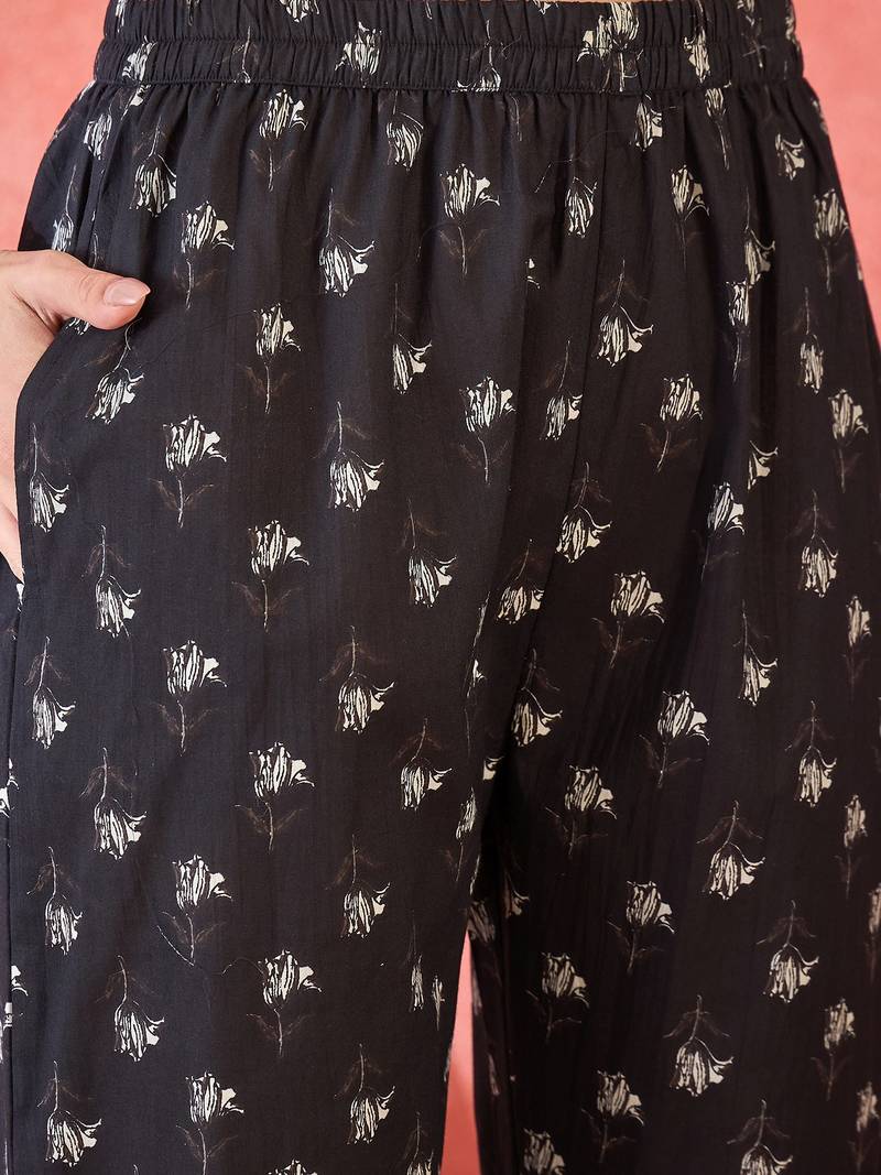 Women's black & white floral printed kurta with trousers & dupatta