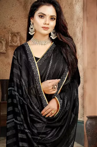 Black color siroski stone work rimzhim patta saree with  blouse