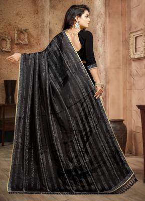 Black siroski stone work rimzhim patta saree with blouse 4