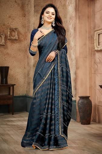 Blue color siroski stone work rimzhim patta saree with  blouse