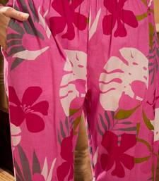 Women's pink & white floral printed a-line kurta with trousers