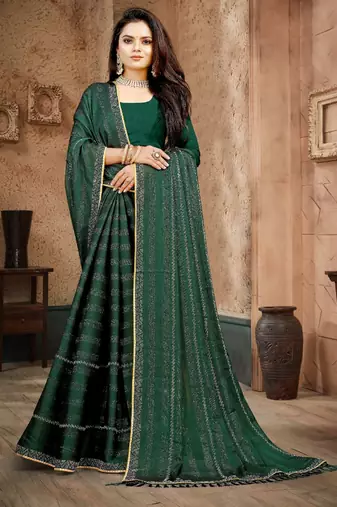 Green color siroski stone work rimzhim patta saree with  blouse