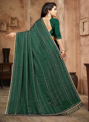 Green color siroski stone work rimzhim patta saree with  blouse 2