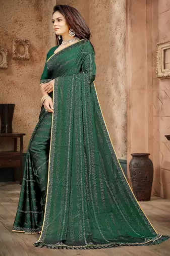 Green color siroski stone work rimzhim patta saree with  blouse