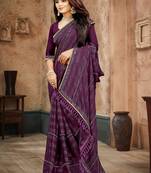 Purple color siroski stone work rimzhim patta saree with  blouse