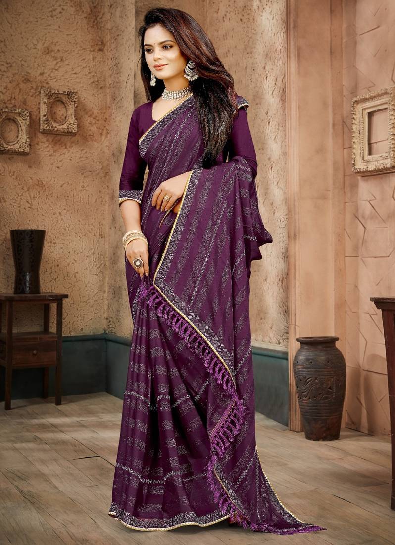 Purple color siroski stone work rimzhim patta saree with  blouse