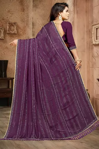 Purple color siroski stone work rimzhim patta saree with  blouse