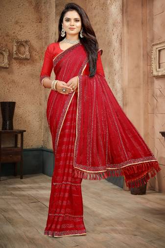 Red color siroski stone work rimzhim patta saree with  blouse