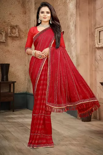 Red color siroski stone work rimzhim patta saree with  blouse