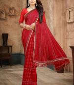 Red color siroski stone work rimzhim patta saree with  blouse